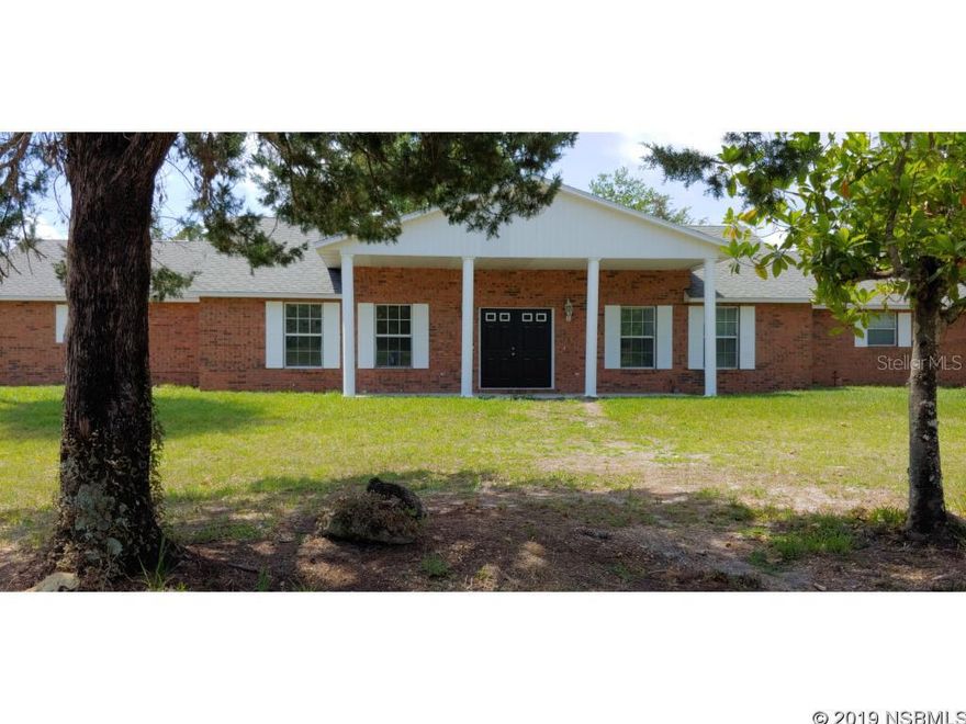 Left side of this bright and well maintained duplex. 2 Bedrooms, 2 Baths, Vinyl wood flooring throughout. Water osmosis system, Florida Room. Attached carport with room for 2 vehicles. Freshly painted and ready for move-in Located on quiet dead end street with trees and plenty of open spaces.