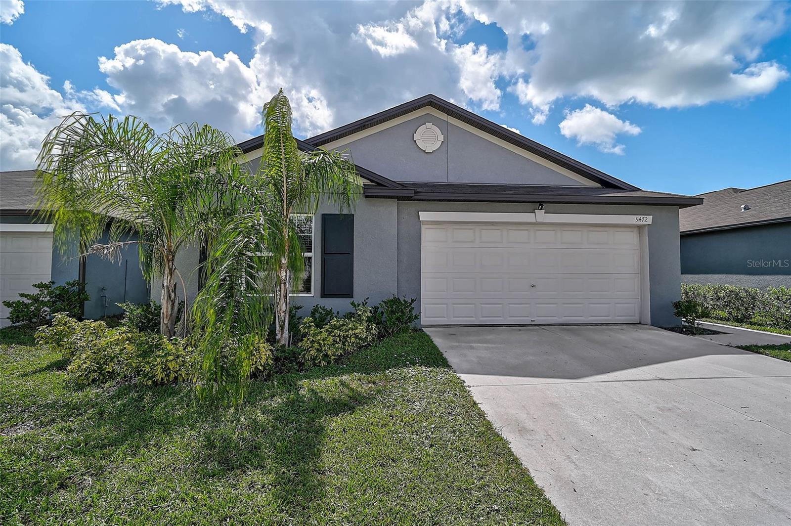 Built in 2022, this single-story 1,841 sq ft home delivers seamless, modern living with a thoughtful split-bedroom design. An airy, open-concept great room connects the kitchen, dining, and living areas for easy everyday flow and effortless entertaining. Three secondary bedrooms sit behind the kitchen in their own private wing—ideal for guests, office, or playroom—while the expansive primary suite is quietly set in the back corner, a peaceful retreat with backyard views. Outside, enjoy a large, privacy-fenced backyard with room to relax, play, or garden. Move-in ready and designed for convenience on Blue Azure Drive.