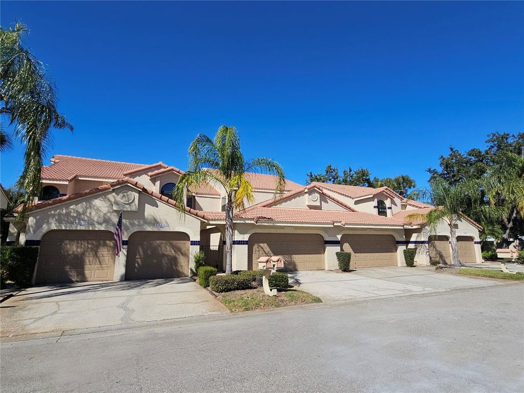 Photo of 10488 Saint Tropez Place #102, Tampa, FL 33615 (MLS # TB8469296)