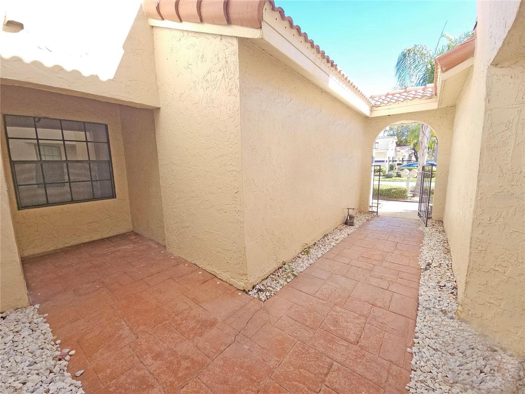 Photo of 10488 Saint Tropez Place #102, Tampa, FL 33615 (MLS # TB8469296)