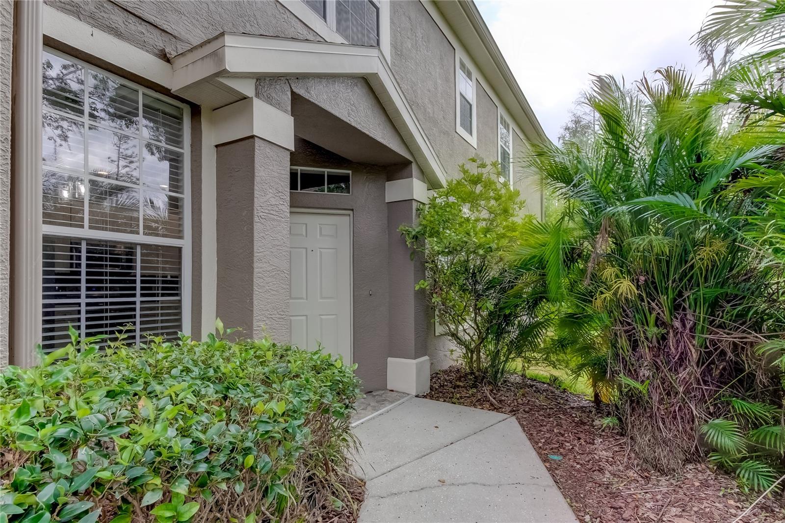 Welcome to 11068 Windsor Place Circle, a beautiful townhome located in the highly sought-after Westchase area of Tampa, FL. This 2-bedroom, 2.5-bathroom townhome features a rare 2-car garage and has been recently updated with a brand-new kitchen. As you enter the home, you are greeted with a spacious floor plan, perfect for entertaining. The newly renovated kitchen boasts quartz countertops, stainless steel appliances, and plenty of cabinet space. The living and dining areas are flooded with natural light and feature beautiful laminate flooring throughout. Upstairs, you'll find the two bedrooms and a spacious bonus area. The master suite features a large walk-in closet and a newly updated bathroom with a luxurious shower. The second bedroom is quite large and has a spacious closet. Other notable features of this townhome include a screened-in lanai and access to the Windsor Place Community pool. Located in the heart of the 33626 zip code, this townhome is just minutes from shopping, dining, and entertainment options. With easy access to major highways, this home is also a short drive from Tampa International Airport, downtown Tampa, and beautiful Gulf Coast beaches. Don't miss out on the opportunity to make this beautiful townhome your new home. Contact us today to schedule a showing.