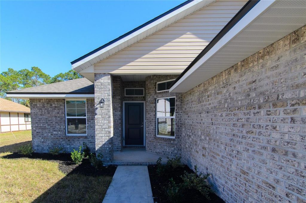 Photo of 35 Farnell Lane, Palm Coast, FL 32137 (MLS # FC317292)