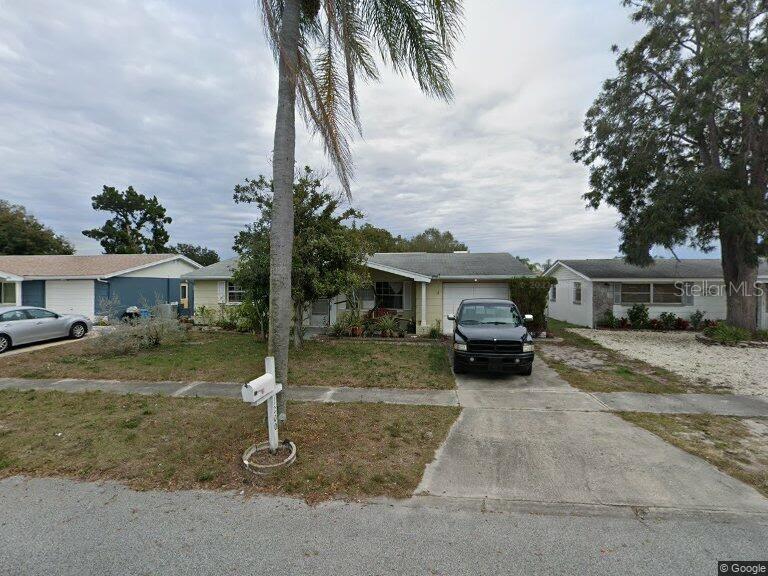 INVESTOR SPECIAL!!!! This property has fire damage contained mostly to the garage. Easily can be made into a 3/2 or convert the garage for a 4/3. Located near everything in Holiday, FL this property just needs some TLC to bring it back to it's full potential. Great as a single family home or an income producing rental / AIR BnB Buyer pays all closing costs, cash / hard money only Schedule a showing today!