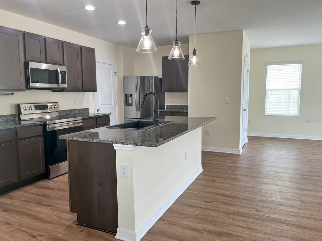 Photo of 7690 Tuscan Bay Circle, Wesley Chapel, FL 33545 (MLS # TB8414104)