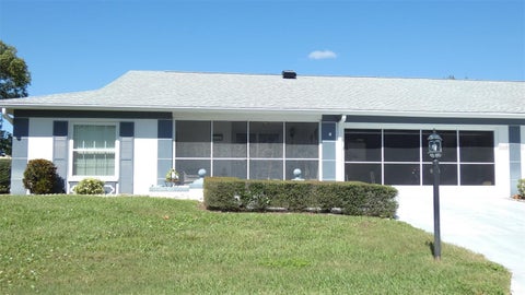 Photo of 11149 Sandtrap Drive, Port Richey, FL 34668 (MLS # W7890504)