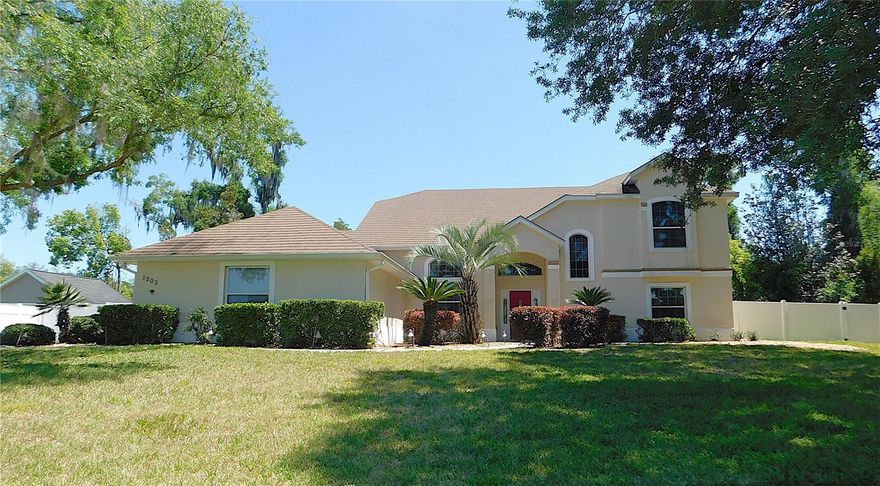 WELCOME TO SUMMERTON! Nestled in a charming SE Ocala neighborhood lined with trees & sidewalks, this impressive 3BR/2BA/2GA home offers 2336 sf living area, a dedicated office/hobby room PLUS detached 2-car garage on a beautifully landscaped .63-acre lot.. Highlights include soaring 22 FOOT CEILINGS, METAL SHINGLE ROOF, PRIMARY SUITE BALCONY, & NO CARPET THROUGHOUT! This house floods with natural light! Gorgeous glassed front door opens to living room w/gas fireplace stove & wall of French doors, formal dining room, open kitchen w/SS appliances, pantry closet, eat-at bar & darling breakfast room, primary suite encompasses entire top floor w/593sf living area, bay window wall, newly built balcony overlooking backyard,2 walk-in closets w/built-ins & BA w/dual sink & make-up vanity, soak tub, glassed shower w/dual heads & private toilet, BR#2 w/double closet w/built-ins, BR#3 w/French doors to back porch, remodeled guest bathroom w/glassed shower, stocked laundry room w/storage cabinets, hanging rod & pocket door to dedicated office/hobby room w/windows for natural light.. Home has storage for days w/several built-in closets for coats & linens, storage room under stairs PLUS walk-in closet for extra pantry space! Side-loading 26x22 double garage w/park pad & rolling double gates open to DETACHED 24x28 double garage w/side door, window AC & separate panel box with garages equipped w/auto openers.. Expansive back covered porch overlooks fenced backyard with plenty of room for a pool & double gates on each side giving easy access for boats & trailers.. Extras include zoned HVAC units, pocket doors throughout, tray ceiling in primary suite, under-cabinet lighting & stone backsplash in kitchen, ceiling fans & built-ins for closets in all bedrooms, propane tank for fireplace, irrigation system, utility sink in garage, separate storage shed for golf cart/mower, numerous outlets in detached garage for convenience, attic storage in both garages.. AND YES, IT IS A METAL ROOF THAT LOOKS SHINGLED.. WOW! GREAT SCHOOLS! WONDERFUL LOCATION! YOUR NEW HOME AWAITS!