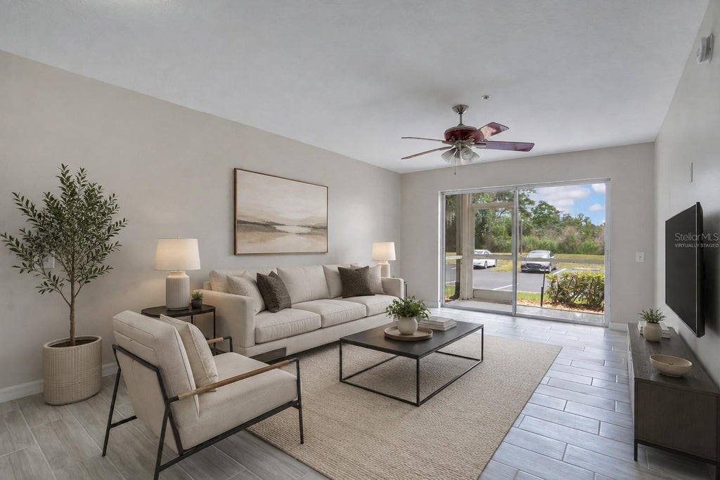 Photo of 3960 Southpointe Drive #504, Orlando, FL 32822 (MLS # O6448811)