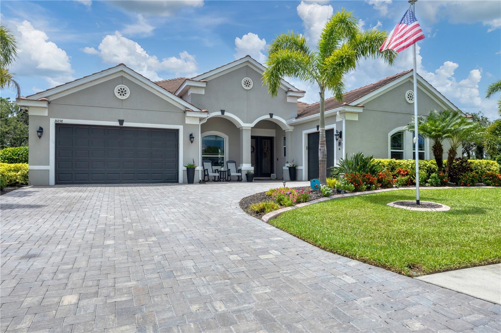 Your Private Florida Paradise in The Reserve at Twin Rivers! Built in 2020 and thoughtfully expanded, this beautifully upgraded Medallion Home Barbados model offers the perfect blend of luxury, function, and privacy on a rare oversized cul-de-sac lot—the only home in this quiet cul-de-sac—with serene pond and conservation views. With 4 bedrooms, 4 full baths, plus a private entry Mother-in-law suite (with kitchenette, bath, walk-in closet), this spacious 3,616 sq ft home offers 5 total bedrooms, a truly multi-generation home. A split 3-car garage (including an expanded bay ideal for a workshop, boat, or motorcycle in the single car garage) has plenty of storage. A dedicated portable generator plug-in for peace of mind is installed. Inside, enjoy a formal dining room with butler's pantry, chef’s kitchen with quartz countertops and stainless appliances, a bright family room, There is a bonus room (perfect for a game room or media space), and a private home office with direct access from the owner’s suite. The expanded owner’s retreat offers dual walk-in closets and spa-like bath. The outdoor living area is a true resort-style oasis: heated saltwater pool & spa, new outdoor kitchen, newly resurfaced lanai, upgraded pool lighting, picture window pool cage, putting green, garden, and a swinging bench—all overlooking the fenced backyard and natural preserve. Energy-efficient features include dual-zone A/C with 4 zones, radiant barrier insulation, WiFi boosters, and network ports throughout. Bonus room and In-law suite offer privacy shades. Additional upgrades: hurricane shutters, poured curb for landscaping, Ring doorbell, security cameras, upgraded closet systems. Located in The Reserve at Twin Rivers, a private gated boutique community close to I-75, I-275, shopping, dining, and top-rated schools—this exceptional home offers unmatched privacy, convenience, and modern Florida living!