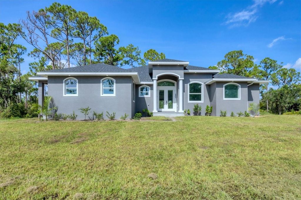Photo of 1311 Friar Street, Port Charlotte, FL 33953 (MLS # N6140215)