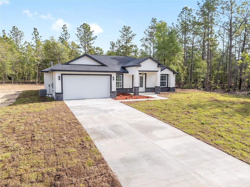 Photo of 8269 SW 122nd Avenue, Dunnellon, FL 34432 (MLS # OM713245)