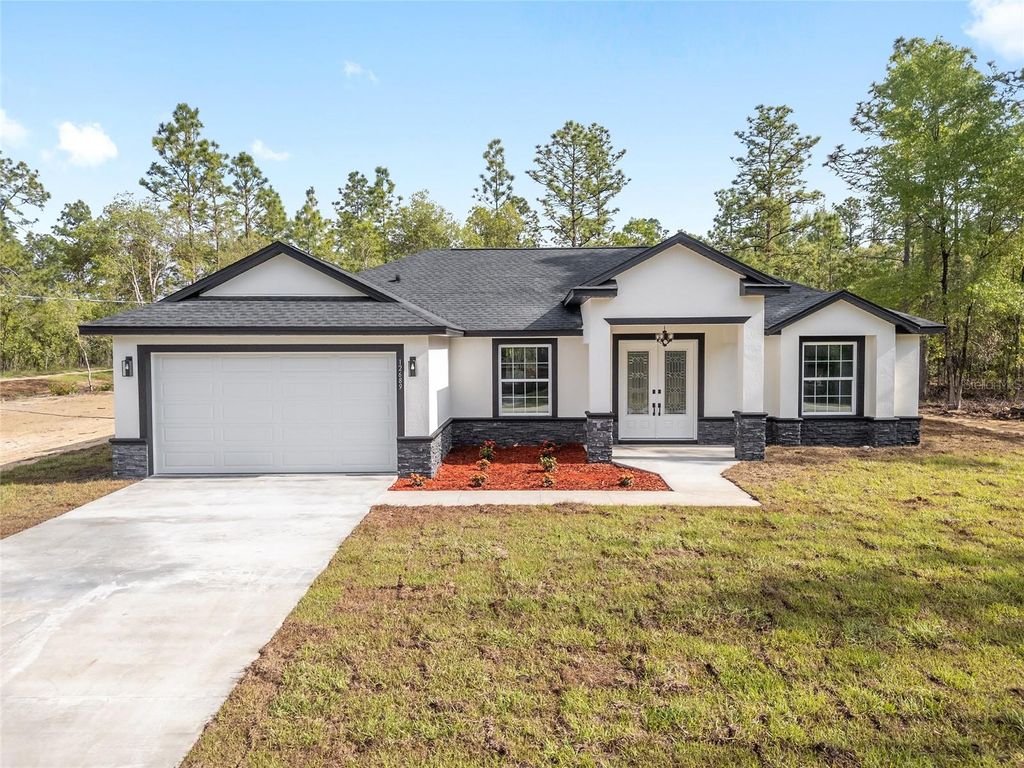 Photo of 8269 SW 122nd Avenue, Dunnellon, FL 34432 (MLS # OM713245)