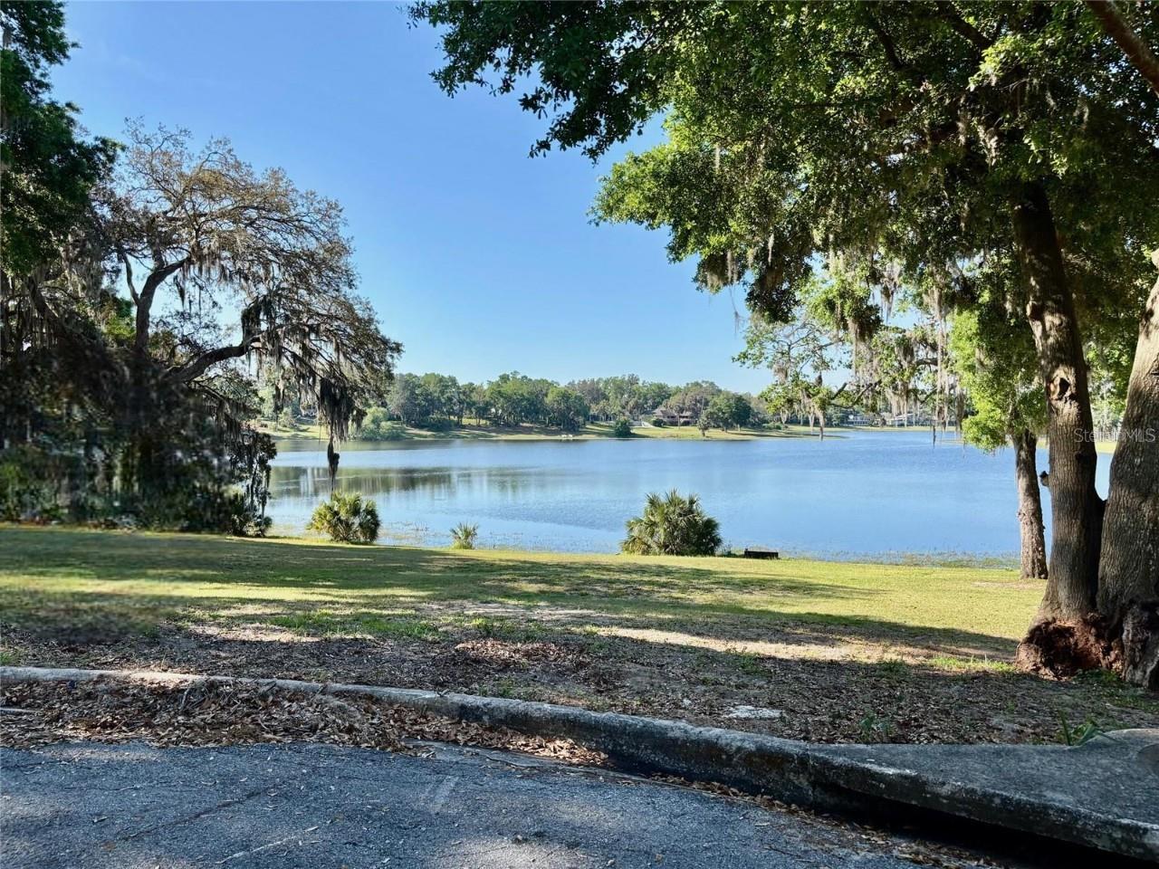 Discover the perfect canvas for your dream home on this beautiful 0.40-acre CUL-DE-SAC lot, boasting 174 feet of LAKE FRONTAGE on picturesque Lake Francis in the sought-after Errol Estate community of Apopka! With no HOA restrictions, this prime location offers both tranquility and convenience, just minutes from Highway 429 and 441, providing easy access to shopping, dining, state parks, and the stunning Lake Apopka. As an added bonus, the list price includes ENGINEER-APPROVED building plans for a 3-bedroom, 2.5-bath home with an unfinished basement (totaling 3,245 sq. ft.). Renderings and floor plans are available to help you envision the possibilities! Don’t miss this rare opportunity to build your lakeside retreat in a peaceful yet well-connected community. Call today for more details!