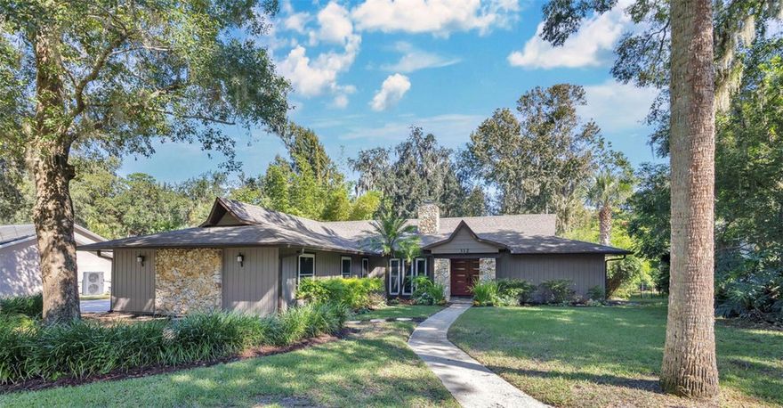 One or more photo(s) has been virtually staged. Welcome to 312 Riverbend Blvd, where thoughtful updates, warm architectural character, and the natural beauty of Sweetwater Oaks come together in a way that just feels right from the moment you walk in. Inside, the home unfolds around a striking three-sided stone wood-burning fireplace,  a true centerpiece that anchors the entire living space. Vaulted ceilings with skylights pull in soft natural light, while two sets of new French doors frame views of the private pool and peaceful greenspace beyond. The updates are extensive yet cohesive: a newer roof (2021), windows and doors (2015), luxury plank flooring (2024), newer HVAC (2017), water heater (2023), and fresh interior and exterior paint (2022) — all coming together with a calm, effortless style. The kitchen continues the refresh with new cabinetry, quartz counters, and a clean tile backsplash, creating a bright, functional space that opens easily to the main living areas. The primary suite brings its own layer of comfort, featuring a beautifully updated bathroom with a glass walk-in shower, double vanity, and all-new cabinetry offering generous storage. Out back, the vibe is pure Florida living: newly re-sealed pool pavers, a sparkling pool with a new Hayward Saltwater Equipment System, and an outdoor space designed for entertaining, late-afternoon dips, and easy weekends at home. And then there’s the location, the part you can’t replicate. Living in Sweetwater Oaks gives you private access to Lake Brantley’s sandy beach and boat ramp, plus Riverbend Park’s tennis and pickleball courts, basketball, playgrounds, a community clubhouse, and miles of shaded trails winding through mature oaks and preserved green space. Just beyond the neighborhood, Wekiva Springs State Park adds another layer of magic with crystal-clear springs, kayaking, wildlife, and endless nature trails. It’s all the outdoor Florida lifestyle you want, wrapped into one address, backed by top-rated Seminole County schools. A beautifully refreshed home. A standout community. And an outdoor lifestyle you feel every day. This is Sweetwater Oaks at its best.