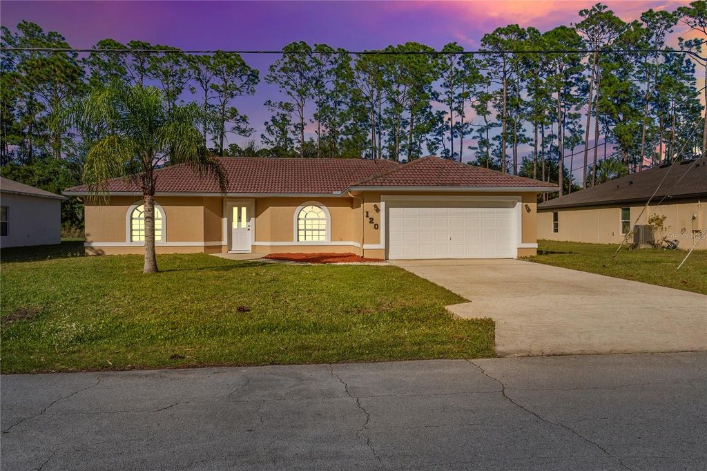 Photo of 120 Point Of Woods Drive, Palm Coast, FL 32164 (MLS # V4948462)