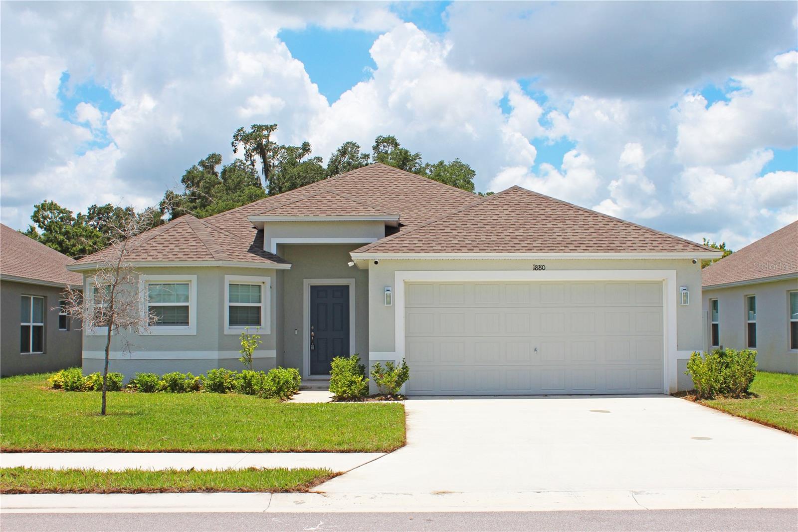 Welcome to your new Florida home! This 4 bedroom / 2 bathroom property features a gated community, stainless steel appliances, 2 car garage, covered back patio, split floor plan, MASSIVE walk in closet for the master bedroom and more. No smoking and no pets. When searching for the property address online, Google search: "Thompson Preserve Blvd". Physical address not on Google yet. All applicants must pass a credit and criminal background check. NO EXCEPTIONS. Hurry and schedule your showing today, this property won't last long!