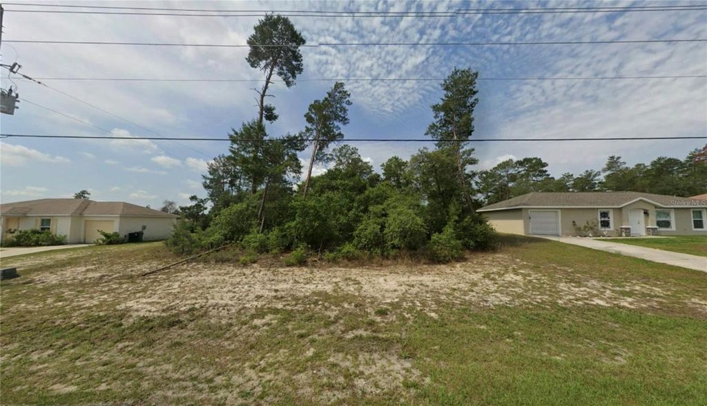 Photo of Tbd Marion Oaks Mnr, Ocala, FL 34473 (MLS # OM721743)