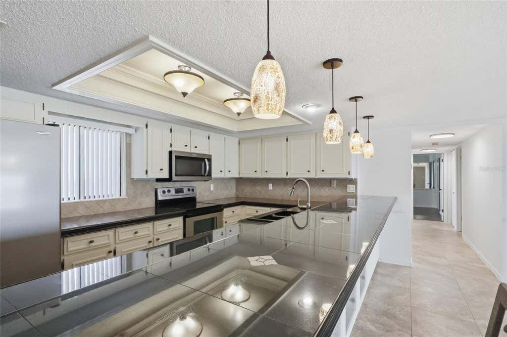 Photo of 944 S Peninsula Drive #5010, Daytona Beach, FL 32118 (MLS # V4950684)
