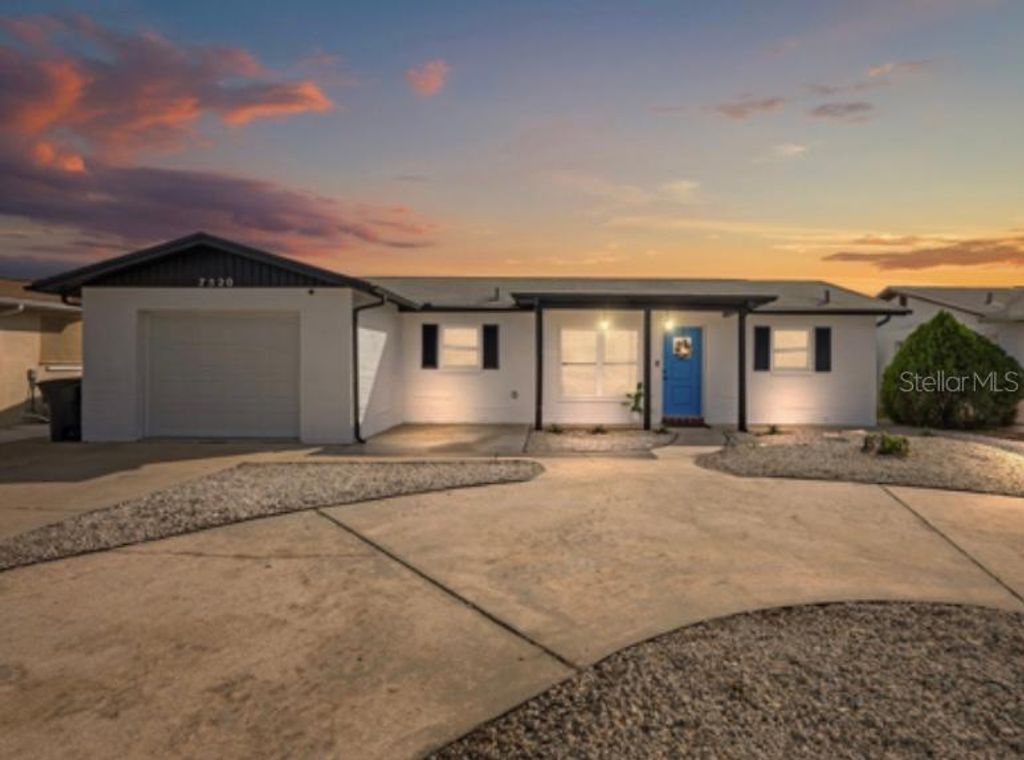 Photo of 7520 Hawthorn Drive, Port Richey, FL 34668 (MLS # TB8441893)