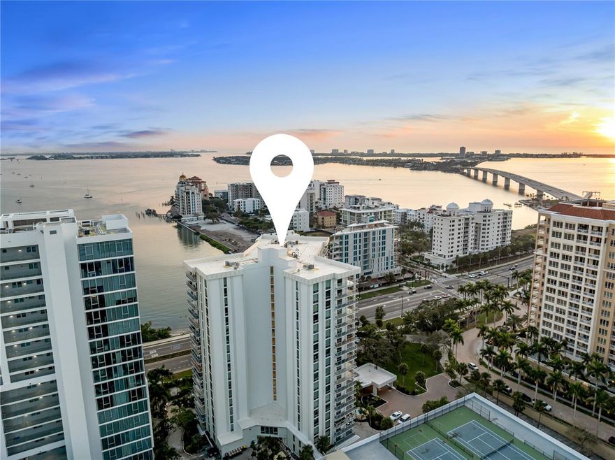 Prepare to be captivated by PANORAMIC BAY VIEWS of Sarasota Bay, Marina Jack, and the sparkling downtown skyline from this beautifully remodeled 12TH-FLOOR CORNER RESIDENCE in One Watergate’s most sought-after stack. With 1,736 sq ft of light-filled living space, 
this 2-bedroom, 2-bath home offers an ideal blend of style, comfort, and everyday convenience.

The spacious layout flows effortlessly from room to room, creating a home that feels both inviting and functional. Thoughtfully REMODELED from top to bottom, including an opened-up kitchen, fully remodeled bathrooms, updated finishes throughout, and hurricane-impact windows, the interior is modern, bright, and truly move-in ready. Everyday living is made simple with an in-unit washer/dryer and a covered, deeded garage parking space.

Step onto your private balcony to watch sailboats drift across the bay, enjoy colorful sunsets, or unwind with peaceful waterfront breezes.

One Watergate continues to evolve with extensive building improvements already completed, including new plumbing and electrical, along with a recently passed SIRS study. The community is now undergoing a full transformation of its common areas and gym, further enhancing its appeal. Residents enjoy tennis and pickleball courts, a beautifully updated pool area with grilling stations, on-site management, and secure entry.

Perfectly positioned between the marina and downtown, this location offers unmatched WALKABILITY, stroll to restaurants, boutiques, cultural venues, Marina Jack, and the Ritz Carlton right next door. St. Armands Circle and Lido Beach are just minutes away over the Ringling Bridge.

If you’re searching for a warm, inviting, move-in-ready home with exceptional water views and true Sarasota downtown lifestyle convenience, then this 12th-floor residence is THE ONE.