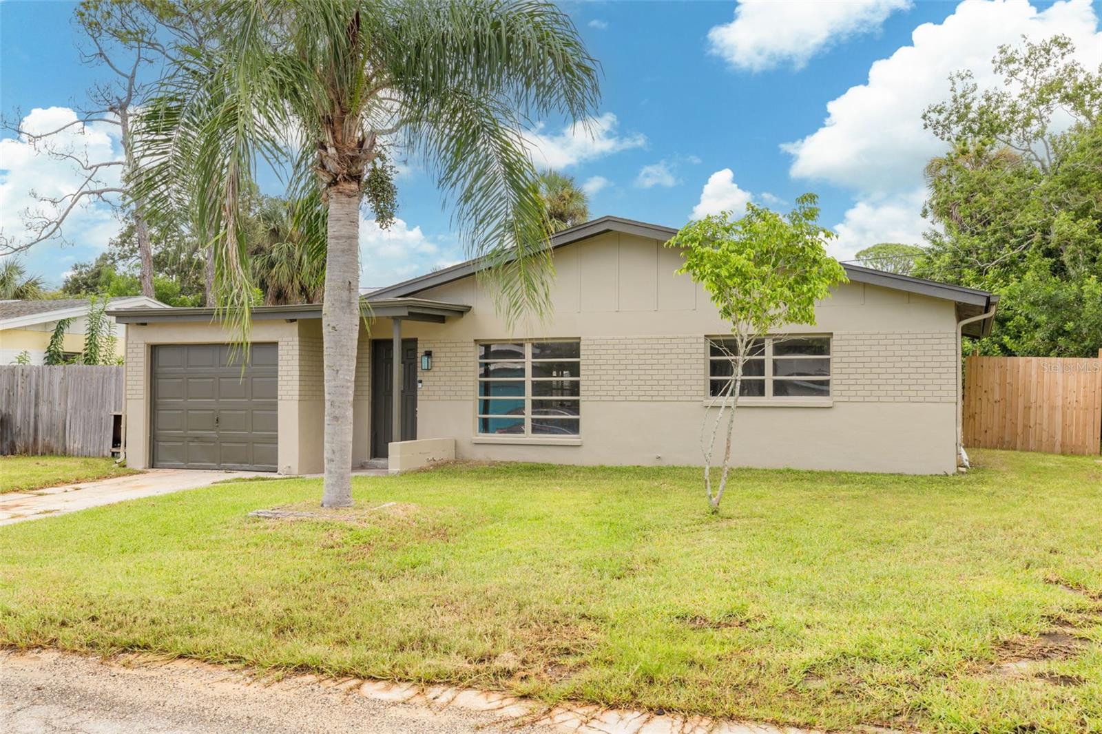 Welcome to 6634 Del Prado Terrace in beautiful New Port Richey!
This charming home offers a spacious living area that flows seamlessly into the bright, modern kitchen, featuring newly updated countertops and cabinetry. The home includes two generously sized bedrooms and a remodeled bathroom, along with a versatile bonus room perfect for an office or guest space. A enclosed Florida room adds extra living space and is ideal for entertaining year-round.
Step outside to enjoy the large, fenced backyard — perfect for pets, play, or relaxing evenings. The home also features a roomy one-car garage with a dedicated storage area that doubles as a laundry room. For peace of mind, the A/C system is brand new in 2025.
Located in the heart of New Port Richey, this golf cart-friendly neighborhood offers easy access to downtown, where you can enjoy concerts in the park, delicious local restaurants, and plenty of community events. Just minutes from the beaches and right off US-19, this home combines comfort, convenience, and Florida lifestyle living at its best. Schedule your tour today!
