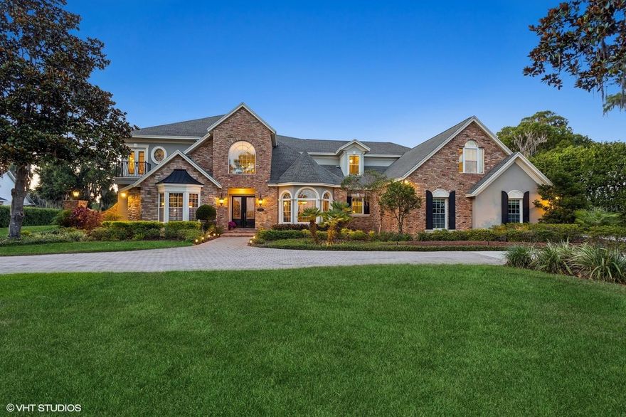 A RARE FIND between two ski lakes! This one-of-a-kind HIDDEN WATERFRONT GEM is located in transitioning RURAL Lutz within a minimal deed restricted subdivision of three 1-AC homesites & LOCATION 20 mins N of downtown Tampa. This millennial-built home was designed to amplify the ambiance of the ever-changing skies with endless SUNRISES & SUNSETS! Enjoy living a quiet & blissful lifestyle next to nature & ducks, birds, fish, turtles & otters. This property has no HOA fees & is OUTSIDE the 100 ft flood zone & OUTSIDE the high wind zone, thereby lowering home insurance costs.***Amenities include boat ramp access to two lakes, a dock on the N lake with covered boat port & boat lift, a backyard barbecue gazebo and a front gazebo!*** The spacious downstairs master suite includes a bathroom, large enough for a massage table with a jacuzzi, water closet with bidet, automated window treatments & a separate dressing room between two walk-in closets.***Built with a VERSATILE first floor In-LAW SUITE/GAME/EXERCISE ROOM, it also offers an ADA compliant KITCHENETTE with adjacent bedroom & ADA COMPLIANT bath***The original owners take pride of ownership with the Jan/2025 installation of a NEW ROOF (with a 50-year transferable warranty, resistant to winds up to 190 mph), rebuilt dock with manufactured wood. The TRAIN AC units have 10-year transferable warranties. Kitchen has a Bosch dishwasher & Thermador stove top with a June/2025 NEW Kitchen-aid double oven/microwave/air fryer combo.***Upgrades include automated phantom lanai screens, two central vacuum systems for up & down, a soaring 2-story wood burning fireplace, entertainment center with surround sound system, 22ft ceilings with automated chandelier lift, wood sub-floors with 3/4- inch white oak planks which can be bleached or re-stained, two stair-cases & ideal location for an ELEVATOR.***The expansive LOFT can be divided into two rooms with barn doors to separate the billiard/game (or child playroom) to create a separate exercise/office or guest area. Currently the loft has a coffee bar & mini frig for guests.***Well insulated with energy efficient Low E vinyl windows, foam filled block walls & includes a security system with fire, glass & noise detectors.***The secluded homesite’s lot extends to the public road with a 30' X 250' long access road which can be landscaped for privacy & is accessed by 3 homesteads composing Ballinger Estates Subdivision (composed of the original 60’s homesite of the former owner & an all brick estate home on Lot 3 (also used by home on the S side property.***Upon entering the home guests are greeted with EXPANSIVE WATERFRONT VIEWS beyond the den, living/dining room & 2nd story bridge & fireplace. Adjacent to the living room is the family room, kitchen & dinette with its 11+ ft floor-to-glass bay window overlooking the paved lanai, back pergola & barbecue grill area, lake & dock.***The location provides residents a “feel” of living in the country while the property is located in the heart of Lutz & Hills County, minutes from 2+ malls, tons of restaurants, 5-grocery stores, 5 churches & is 5 mins from the new St Joseph’s hospital is W of Cheval & N of Avila Golf & Country Clubs. Only 20 mins from TIA & 30-45 mins from Florida's white-sand beaches. Great opportunity to own a lakefront estate priced $393,00 BELOW available APPRAISAL.