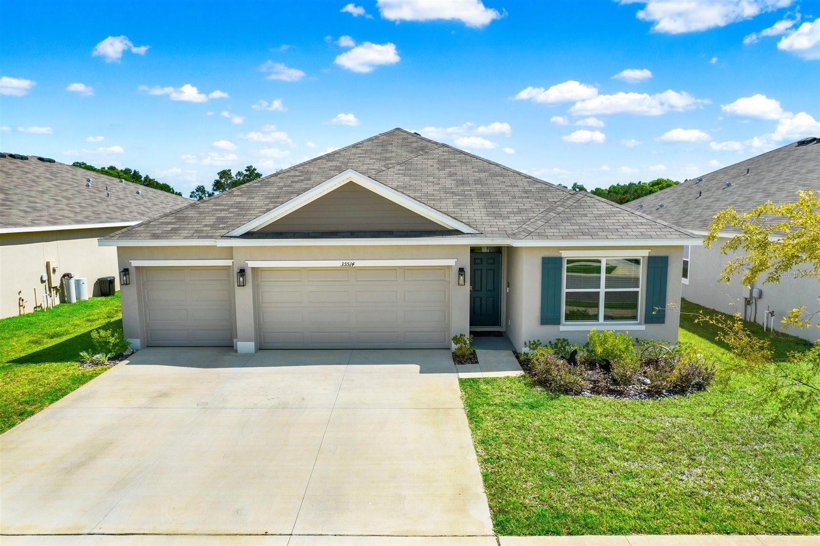 Immaculate 4BR & 3BA Home with 3-Car Garage in Dade City! Welcome to 35514 Mahwah Drive in beautiful Dade City, where rolling hills and natural surroundings create the perfect backdrop for comfortable living. This well designed floorplan offers a wonderful single story home on a premium conservation lot with no backyard neighbors, thoughtfully positioned to showcase lovely backyard views and gorgeous sunsets that make every evening special. You'll love the practical open concept layout where the spacious kitchen, complete with all stainless steel appliances including refrigerator, built in dishwasher, electric range, and microwave, flows effortlessly into the welcoming living area, dining room, and covered lanai that's perfect for enjoying the peaceful natural setting. Relax and unwind in your private jacuzzi while taking in the serene wooded backdrop, then retreat to your comfortable owner's suite located at the back of the home for added privacy. Three additional bedrooms and bathrooms provide flexible space for family, guests, or a home office, while the fourth bedroom includes its own bathroom. Your new location puts you within reach of charming downtown Dade City with its beloved farmers market, Saint Leo University, and fantastic golf destinations including Abbey Golf Course and Lake Jovita Golf and Country Club, while the new SR 52 extension connects you effortlessly to Tampa, St. Petersburg, and Clearwater for both career opportunities and weekend adventures. You'll appreciate having the tranquility of Summit View while staying close to Wesley Chapel's vibrant shopping and dining scene, from Tampa Premium Outlets to Wiregrass Mall and The Grove, plus upcoming neighborhood amenities featuring pickleball and basketball courts, playground, swimming pool, covered gathering spaces, and dog park designed to bring neighbors together. Come see why this charming home nestled in nature's embrace could be your perfect fit. Schedule your showing today and discover where comfort meets the beauty of preserved wilderness.