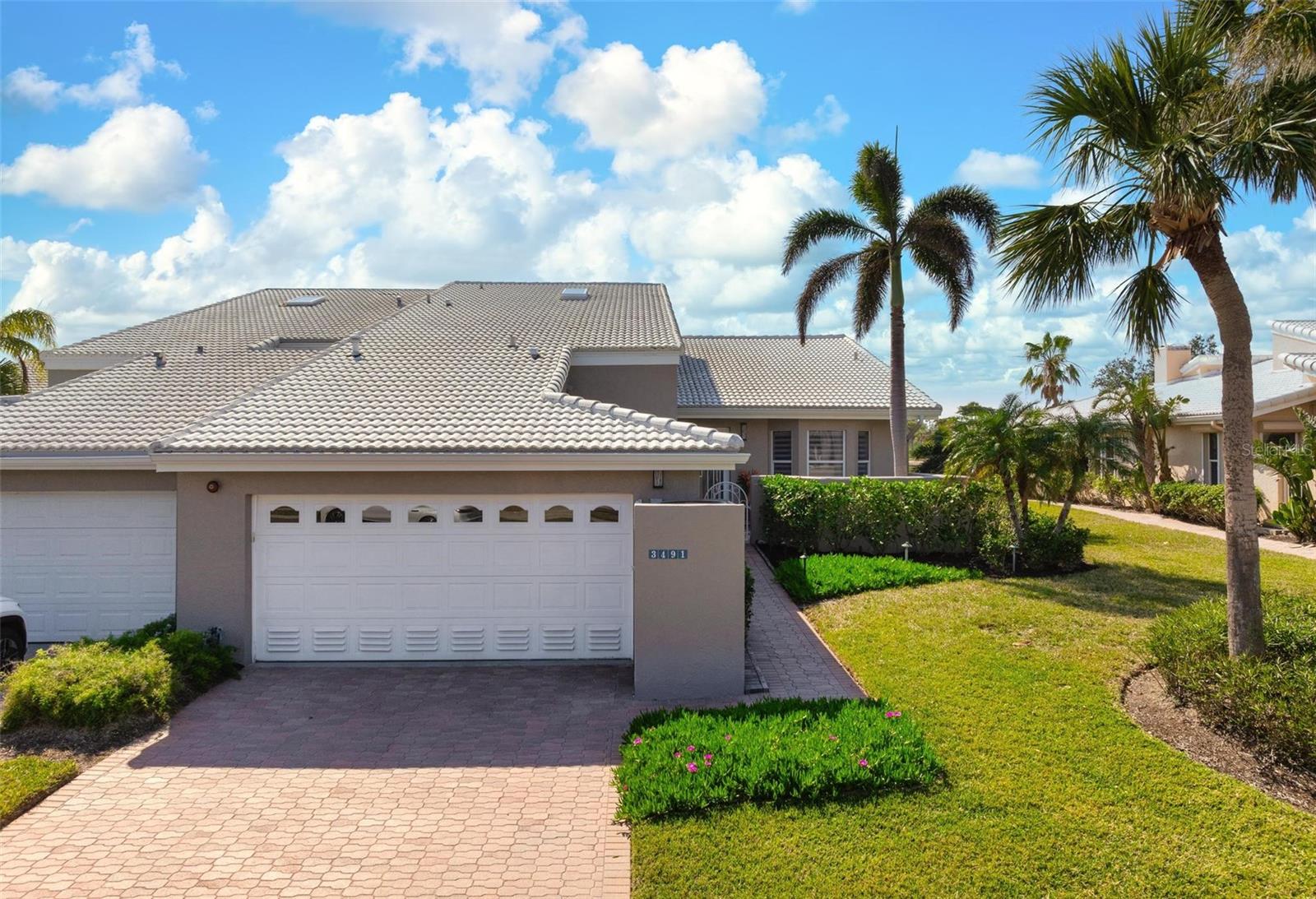 Luxurious Villa with Stunning Lake & Fairway Views
Nestled behind the exclusive gates of the Longboat Key Club, this exquisite three-bedroom, three-bathroom villa in Coreys Landing offers the perfect blend of privacy, elegance, and resort-style living. Positioned on the signature fifth fairway with southern exposure, enjoy breathtaking lake views and an abundance of natural light throughout the day.
Recently renovated to perfection, this home boasts sophisticated finishes, a spacious open floor plan, and an effortless indoor-outdoor flow. Step outside to your private swimming pool and spa, a rare luxury that complements the community’s heated pool and spa. For sports and recreation, take advantage of two Har-Tru tennis courts, or elevate your lifestyle by joining the Longboat Key Club, where world-class golf, tennis, fitness, and fine dining await.
Tucked away in a serene and pristine setting, this villa is the epitome of coastal elegance and effortless luxury. Don’t miss this rare opportunity to own a slice of paradise!