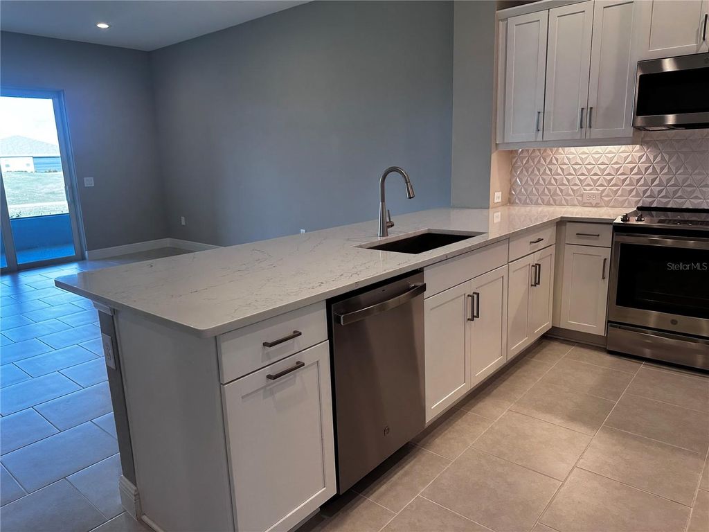 Photo of 24835 Buckingham Way, Port Charlotte, FL 33980 (MLS # C7516151)