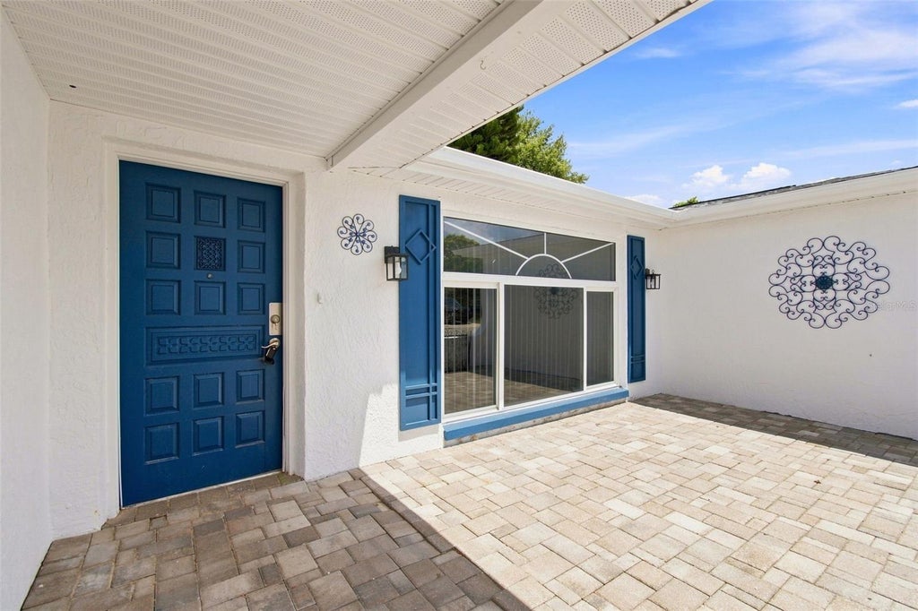 Photo of 7025 Westcott Drive, Port Richey, FL 34668 (MLS # TB8541042)