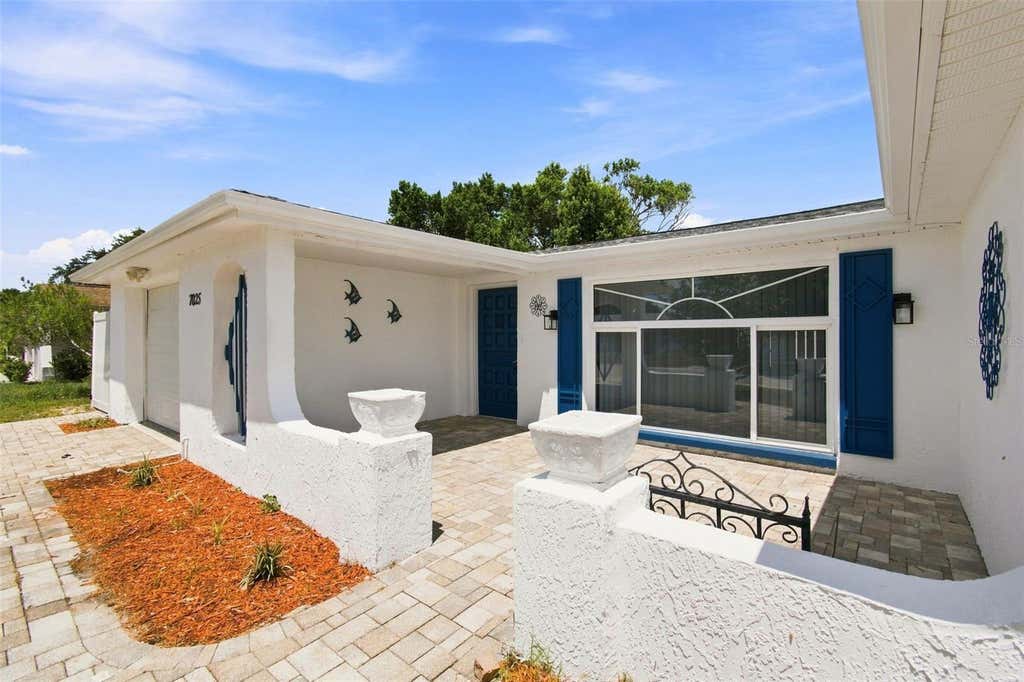 Photo of 7025 Westcott Drive, Port Richey, FL 34668 (MLS # TB8541042)