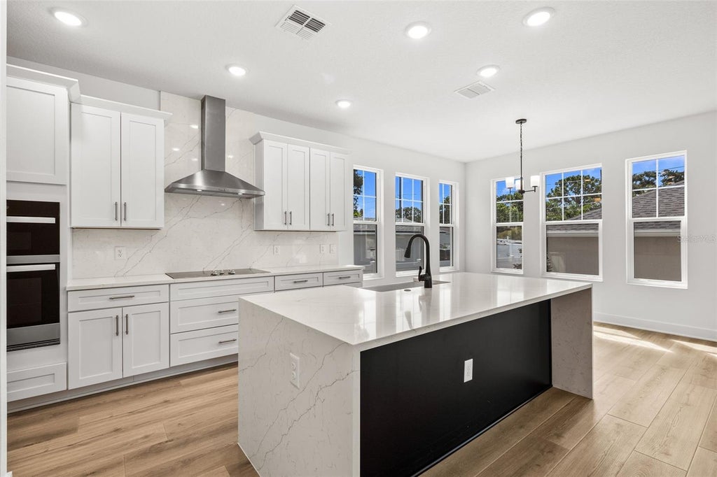 Photo of 324 37th Avenue, St Petersburg, FL 33704 (MLS # TB8520292)