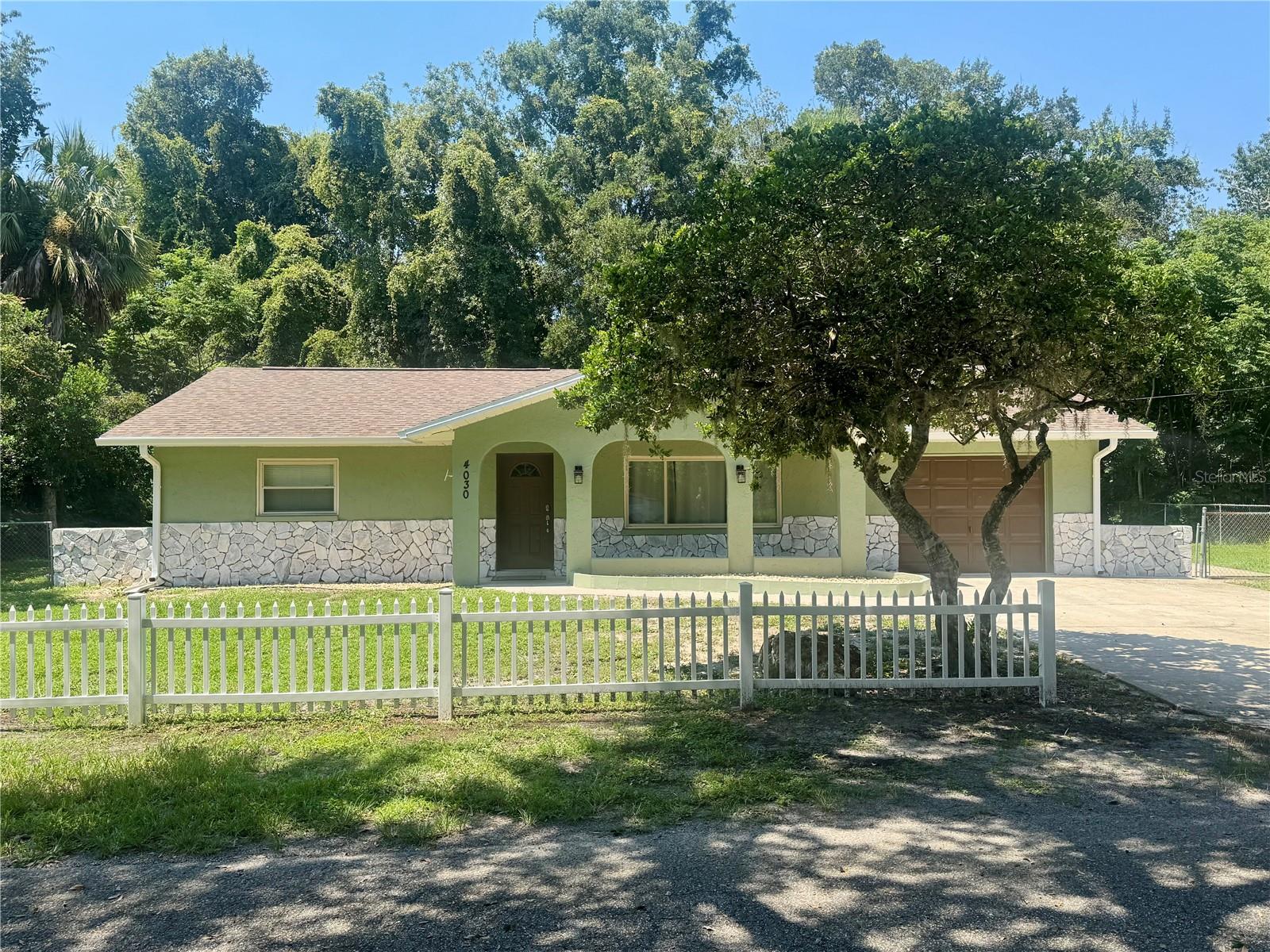 Instant income potential with this turnkey Airbnb opportunity in beautiful Crystal River! This fully remodeled 3-bedroom, 2-bath, 1-car garage home offers 1,803 of living and was built in 1979. The interior boasts wood-look tile flooring throughout, fresh interior paint, a split floor plan, and a stylishly updated kitchen featuring quartz countertops, wood cabinetry, and modern appliances. Additional upgrades include new interior doors, updated lighting and switches, waterproofed drywall (1.5' up), mold resistant insulation throughout, and thoughtful decorator finishes. Outdoor features include a fenced backyard, front covered porch, open patio, gutters, and a new roof installed in 2024. The septic system and drainfield are also new, and the HVAC system was updated in 2021. This property is sold fully furnished—including bikes and kayaks—making it a seamless transition for a vacation rental or personal use. Existing bookings may be transferred to the Buyer if desired. Don’t miss this exceptional opportunity in one of Florida’s most desirable coastal communities!
