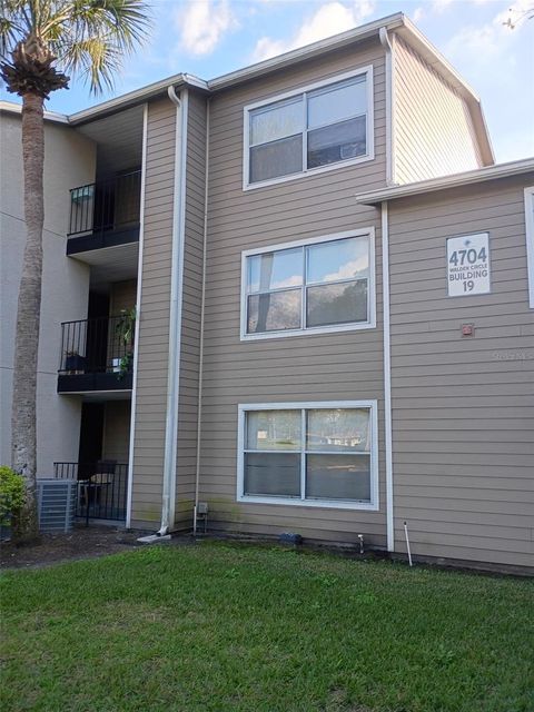 Photo of 4704 Walden Circle #15, Orlando, FL 32811 (MLS # S5141077)