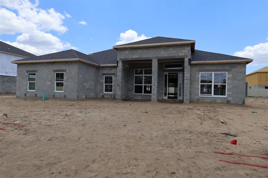 Under Construction. Welcome to 3555 Wolves Creek Place, Apopka, Florida — a stunning new construction home built by M/I Homes. This thoughtfully designed home offers 3,984 square foot of living space, 5 bedrooms, 4 bathrooms, and a well-planned floorplan that blends comfort with quality craftsmanship throughout.

This home includes the following:
* 3,984 square foot of thoughtfully designed living space
* 5 bedrooms and 4 full bathrooms
* Owner's bedroom conveniently located on the 1st floor
* Spacious open-concept living space ideal for everyday living and entertaining
* 3-car garage

This home features an inviting open-concept living space that creates a seamless flow between gathering areas, perfect for both relaxed daily routines and hosting guests. The owner's bedroom is situated on the main level, offering convenience and privacy. With 4 bathrooms, this home provides ample space for family members and visitors alike.

The neighborhood surrounding this home offers a welcoming atmosphere with easy access to local parks and recreational areas. Families and outdoor enthusiasts will appreciate the proximity to green spaces that provide opportunities for walking, sports, and enjoying nature.

Built with attention to detail and quality of design, this M/I Homes new construction delivers a move-in-ready experience with the reliability and craftsmanship you expect from a trusted builder.