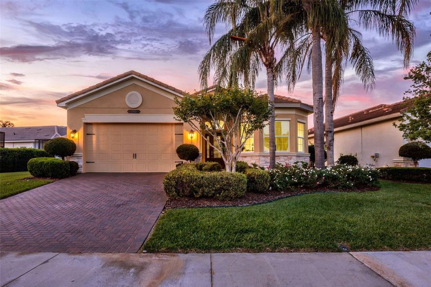 Welcome to the highly sought-after Chandon floorplan by GL Homes, located in the prestigious community of The Ridge at Wiregrass Ranch—where luxury living meets resort-style amenities in the heart of Wesley Chapel. The Chandon features nearly 2500sf of living space with 4 bedrooms, 3 bathrooms and open main living area. This spacious and thoughtfully designed home offers the perfect blend of elegance and functionality, featuring an open-concept layout ideal for both everyday living and entertaining. The Chandon floorplan is known for its generous living spaces, including a chef-inspired kitchen with premium finishes, a large center island, and seamless flow into the expansive great room and dining areas. The owner’s suite serves as a private retreat with a spa-like bath and oversized his/hers walk-in California closets. Three additional bedrooms and flexible living spaces provide versatility for guests, a home office, or multi-generational living. The well-appointed kitchen is a cooks delight featuring gorgeous Granite countertops, full Stainless Steel appliance package which includes a top-of-the-line LG Induction Range with true Convection Oven, Reverse Osmosis filter at the double-side stainless steel sink. Notice the custom trim touches on the kitchen island. The Great Room features CUSTOM COFFERED CEILINGS for a truly elegant look and feel. Step outside and enjoy Florida living at its finest with a covered lanai with views of the pond and conservation—perfect for relaxing evenings or hosting gatherings year-round. Conveniently located just minutes from top-rated schools, shopping, dining, and entertainment—including Wiregrass Mall and Tampa Premium Outlets—this community offers the perfect balance of luxury, convenience, and lifestyle. The Ridge is a luxury community in Wesley Chapel centrally located on SR 56. Amenities at The Ridge include an 11,500 sf indoor clubhouse located on 5.5-acres. The clubhouse features an event room, an indoor sports complex, game room, movie theatre, fitness center, indoor/outdoor bars and kitchen. Outdoors boasts 4 lighted clay tennis courts, basketball, sand volleyball, resort pool with beach entry, lap pool, fire pit, and water play area. The community is minutes from the Shoppes at Wiregrass, Tampa Premium Outlets, 3 local hospitals, restaurants and Top-Rated Area Schools. Call today for your opportunity to view this home. Experience the best of Wesley Chapel living—where every day feels like a vacation.