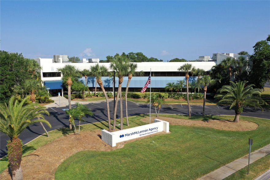This fully renovated, two-story single tenant office building in Clearwater, FL is a standout property, currently fully tenant occupied and offered as an investment sale opportunity. Nestled on a spacious rectangular parcel, the site boasts ample surface parking and mature landscaping.

Recently remodeled in 2019, the interior features Class A finishes including new millwork, upgraded interior finishes throughout, modern interior partitions, stylish flooring, energy-efficient LED lighting, elegant interior doors, glass sidelights, and updated restrooms. Additionally, the majority of HVAC units were replaced in 2018/2019, and the roof was newly replaced in 2021.

When you arrive at the property, visitors are greeted by an impressive entrance and lobby area, complete with a circular driveway and convenient guest parking adjacent to the main building entrance. A prominent monument sign welcomes visitors, complemented by an above-average parking ratio in the expansive surface parking lot.

Step inside to discover a thoughtfully designed interior layout boasting a mix of private offices and open areas for cubicles, all enhanced with upgraded ceilings and lighting. The main building lobby showcases an impressive boardroom with a nearby coffee and catering station, complemented by various meeting and conference spaces of varying sizes throughout the office.  Each floor is equipped with a breakroom for added convenience. Additional property features include small and large training rooms, work areas, storage space, and varying-sized private offices. The property also offers a dedicated mail room and IT room.