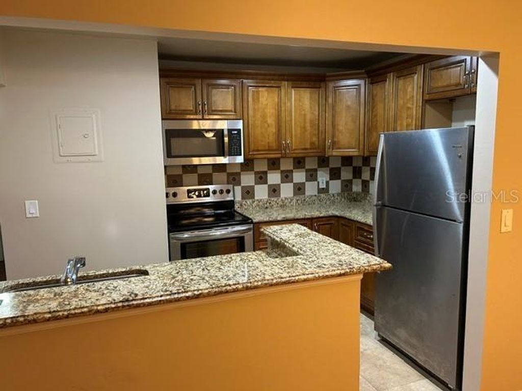 Photo of 130 Jasmine Woods Court #9B, Deltona, FL 32725 (MLS # R4911141)