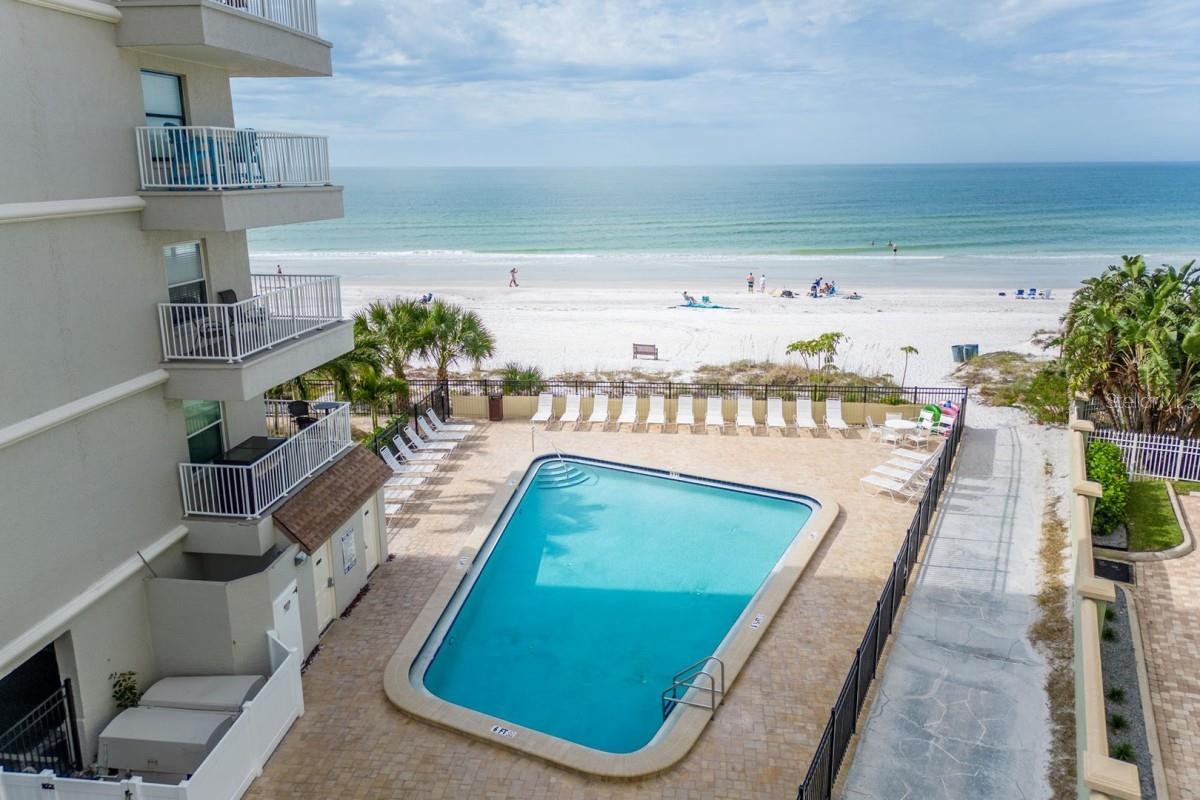 COASTAL LUXURY | DIRECT GULF-FRONT | INCOME POWERHOUSE
Stunning and fully remodeled 3-bedroom, 2-bath Gulf-front condo located in the highly desirable Seagate building in Indian Shores. This top-floor unit offers unobstructed beach and sunset views from an oversized private balcony. A rare combination of luxury, location, and income potential in a 3-day minimum rental building, with annual gross rental income potential exceeding $100,000.The light-filled interior showcases open Gulf views from the moment you walk in, with large sliding glass doors leading to the spacious balcony. Two parking spaces included, one of which is a prime under-building garage, as well as a designated space out front.
Seagate amenities include a beachfront heated pool, tiki huts, BBQ grills, and direct beach access. Beach chair rentals are available out back. Located within walking distance to the popular Salt Rock Grill and close to shops, entertainment, and beach attractions.
The building is newly renovated exterior improvements, including new balcony railings, resurfaced walkways, and fresh exterior paint—adding further long-term value.
Don't miss this opportunity to own a turnkey beachfront property with strong rental income and unbeatable Gulf views.