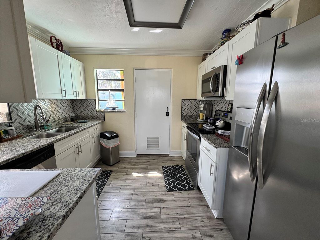 Photo of 756 Mandalay Avenue, Clearwater Beach, FL 33767 (MLS # TB8485832)