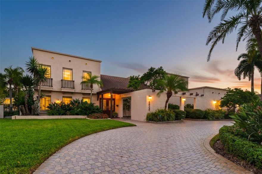 Welcome to your waterfront oasis in the highly sought-after Beach Park Isles. Perfectly situated on an oversized 11,000+ square foot lot with 100 feet of pristine water frontage and just a couple of lots from the open bay, this custom-built residence offers the very best of Tampa Bay living. Spanning over 4,000 square feet, this two-story home features 5 spacious bedrooms, a two-car garage, and a thoughtfully designed floor plan ideal for both everyday living and effortless entertaining.

Meticulously maintained by its original owner, the home showcases impact-rated windows and doors, an updated roof, newer HVAC systems, and an updated kitchen with high-end appliances, providing comfort, efficiency, and peace of mind. The property has never experienced water intrusion from storms, offering exceptional security and stability in a premier waterfront setting.

Designed to embrace indoor-outdoor living, the expansive backyard is anchored by a large pool and private dock, creating a true waterfront retreat perfect for relaxing or entertaining while enjoying tranquil water views and breathtaking sunsets. Boating enthusiasts will appreciate the generous water frontage, deep-water access, and quick, easy access to Tampa Bay—ideal for kayaking, paddleboarding, or heading out for a day on the water.

Located in an A-rated school district and just minutes from top-rated schools, Tampa International Airport, downtown Tampa, and the area’s finest dining and shopping, this home delivers both privacy and convenience. Whether you choose to personalize and elevate the existing residence or simply move in and enjoy, this is a rare opportunity to own a legacy property in one of South Tampa’s most desirable and established neighborhoods.