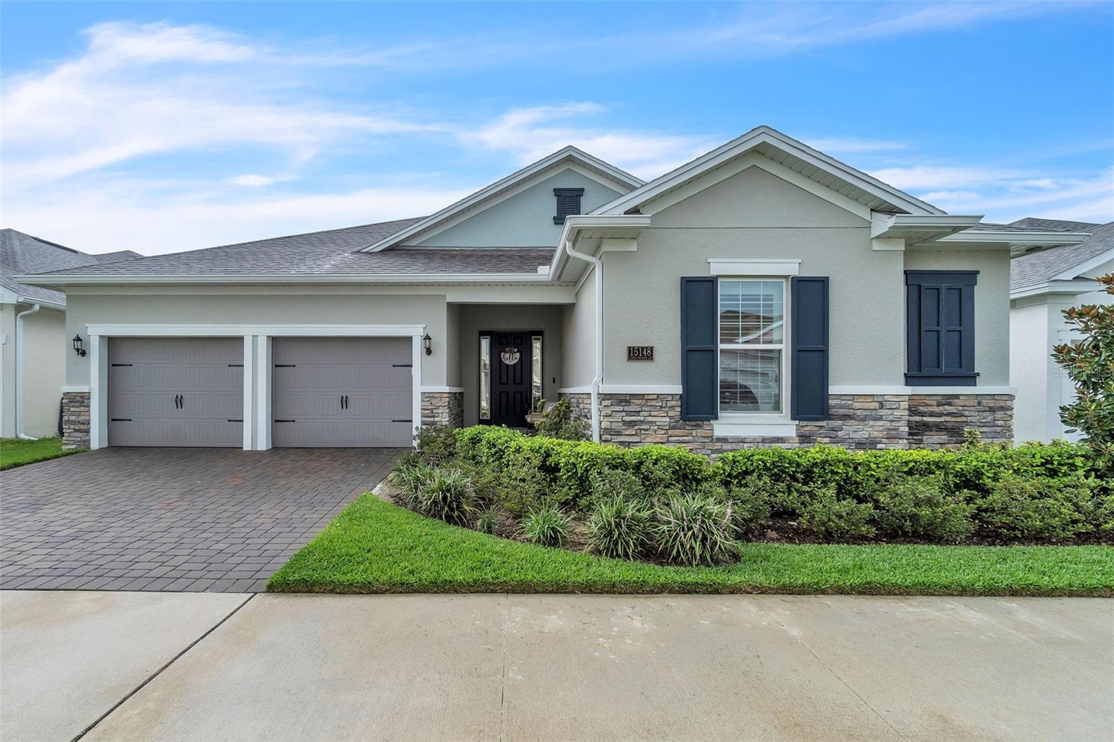 Welcome to 15148 Lake Bessie Loop, an inviting and spacious home located in the peaceful Lakeside at Hamlin community of Winter Garden. This beautifully cared-for residence offers a perfect blend of comfort, function, and thoughtful upgrades, making it ideal for both everyday living and special moments with family and friends.
Step inside to experience an open concept layout filled with natural light and a warm, welcoming feel. The living areas flow effortlessly into a large kitchen featuring a wide open island, abundant cabinetry, under-cabinet lighting (added in 2024), and a custom range hood (installed in 2025), all designed to bring people together. Throughout the home, you’ll find beautiful vinyl plank flooring that enhances the open feel and adds durability.
One of the standout features of this home is the spacious upstairs loft, paired with a large bedroom and one and a half bathrooms. The loft and back porch are equipped with built-in speakers, perfect for relaxing evenings, movie nights, or entertaining guests. The main living area also includes an entertainment center with a built-in electric fireplace (installed in 2025), creating a cozy and stylish atmosphere.
Outside, the private backyard is set up for enjoyment with an outdoor kitchen and vented hood (installed in 2024), ideal for weekend barbecues or casual get-togethers. Additional updates include shutters and blinds (installed in 2023), a vinyl fence (installed in 2023), gutters (installed in 2023), garage storage racks (installed in 2024), and the home is wired for two electric vehicle chargers (wiring completed in 2023 and 2024), providing added flexibility for future EV needs.
Lakeside at Hamlin is a family-friendly community surrounded by walking trails and scenic spaces. It is conveniently located near SR 429 and Avalon Road, with easy access to Horizon West and downtown Winter Garden. The area continues to grow with exciting new restaurants and entertainment options nearby, along with highly rated public and private schools.
Whether you are searching for a home that brings together comfort, lifestyle, and location, or you are looking to invest in one of Central Florida’s most desirable areas, 15148 Lake Bessie Loop offers a rare opportunity to enjoy it all.