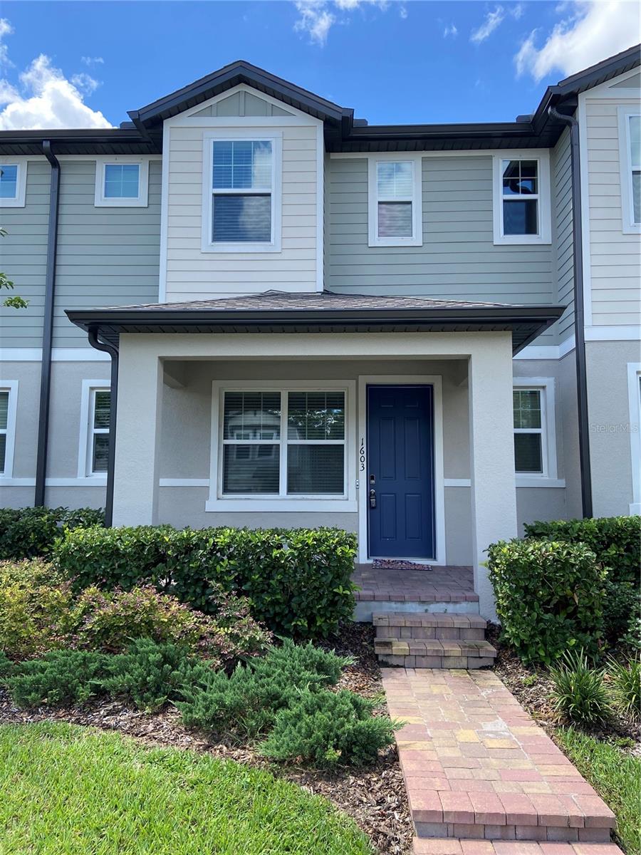 1603 Grand Rue Drive is a 3 bedroom, 2.5 bath two story town home located in the Legacy Place community in Casselberry. Upon entry, you are welcomed into the oversized living area overlooking the kitchen and dining area. The kitchen features a full suite of stainless steel appliances including refrigerator, dishwasher, stove top and over the range microwave as well as spacious counter tops. The half bath is located with easy access for guests. Located on the second floor is the master bedroom and both additional bedrooms. The master suite has a large walk in closet and private access to the master bathroom featuring dual vanities and a glass enclosed standing shower. Both additional bedrooms are well sized with easy access to the second full bathroom. The bathroom features the same beautiful counter tops throughout the home and a shower tub combo. Rounding out the home is the laundry room, with hookups to accommodate a full sized washer and dryer, and the two car garage. This home will not last long!