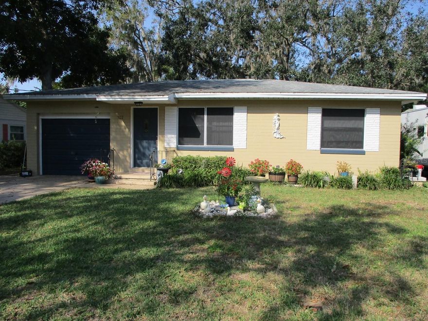 This charming home is located in a quiet neighborhood. No issues with flooding.  Home features natural hardwood flooring in Living Room and Bedrooms and newly installed vinyl planking in Kitchen and Dining Room. Enjoy views of the manicured back yard from the Dining Room and screened Lanai.  A/C less than 2 years old, roof is 4 years old. Electrical panel newly installed 3 years ago.
Single car garage and also a 10x20 prefab storage building in back yard. ;Water: City