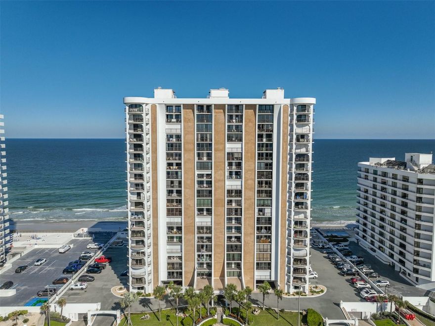 COASTAL ELEGANCE MEETS OCEANFRONT LIVING! WELCOME TO OCEANS FOUR: A 19TH-FLOOR EXCLUSIVE RESIDENCE. EXPERIENCE THE RARE PRIVILEGE OF ARGUABLY ONE OF THE MOST DESIRABLE FLOOR PLANS (in Volusia County) THAT EXTENDS FROM EAST TO WEST, CAPTURING DIRECT, DUAL-FACING VISTAS OF THE ATLANTIC OCEAN AND THE HALIFAX RIVER. 

YOUR SEMI-PRIVATE ELEVATOR WHISKS YOU AWAY TO A VESTIBULE WITH ONLY TWO UNITS PER FLOOR. GET READY TO EMBRACE OCEANS FOUR, A MAJESTIC 20 STORY BUILDING WITH 114 UNITS, 6 ELEVATORS IN 3 TOWERS. IT'S POST TENSION CONSTRUCTION MAKES IT AN OCEANFRONT FORTRESS ON THE WORLD'S MOST FAMOUS BEACH. 

THIS IMMACULATE CONDO IS IN PERFECT CONDITION AND OFFERS 1,700 SQUARE FEET. THE LIVING ROOM IS FOCUSED ON UNOBSTRUCTED, DIRECT OCEAN VIEWS, AND FEATURES A 14-FOOT OCEANFRONT BALCONY ALONG WITH RIVERFRONT BALCONIES.

THE OCEAN VIEW DEMANDS ATTENTION THE MINUTE YOU STEP INTO THIS GRAND LIVING ROOM! ARCHITECTURAL DETAILS LIKE CROWN MOLDING AND TALL BASEBOARDS FRAME THE INTERIOR, WHICH IS RICHLY ACCENTED BY BEIGE TILE FLOORING AND TAUPE WALLS, DELIVERING A CHIC, MONOCHROMATIC DESIGN.

THIS GOURMET KITCHEN SHINES WITH WHITE CABINETRY AND UPDATED APPLIANCES. THE WALL WAS REMOVED TO ACCOMMODATE A WONDERFUL CENTER ISLAND FEATURING BEIGE CORIAN COUNTERTOPS. GOOSENECK FAUCET, CORIAN BACKSPLASH FOR A SEAMLESS  LOOK AND DRUM PENDANT LIGHTING ADDS A WARM, INVITING AMBIANCE.


BOTH BEDROOMS ARE ENHANCED BY THEIR OWN PRIVATE BALCONIES, OFFERING LOVELY RIVER AND CITY VIEWS FROM A WONDERFUL VANTAGE-POINT. THE PRIMARY HAS A CLOSET SYSTEM TO ACCOMMODATE ALL YOUR STORAGE NEEDS.  CONVENIENCE IS ADDED WITH AN IN-UNIT (full size LG) WASHER AND DRYER. 


NOTABLE FEATURES: 2018 NEW SLIDERS AND NOOK WINDOW (impact glass) 2018, HURRICANES SHUTTERS (both sliders and nook window) 2021 AC, 2024 HOT-WATER HEATER. 2023 FULL SIZE STACKED WASHER & DRYER AND SO MUCH MORE!!


EXPERIENCE AUTHENTIC BEACHFRONT LIVING WITH RESORT-STYLE AMENITIES SUCH AS A OCEANFRONT OUTDOOR POOL WITH LARGE SUNDECK, INDOOR POOL AND HOT TUB, STATE-OF-THE-ART FITNESS CENTER, BILLIARD AND GAME ROOM, LIBRARY, OUTDOOR GRILLS. PET FRIENDLY. 1-year minimum rental. All information intended to be accurate but should be verified.