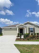 BEAUTIFUL Home in the new Storey Creek Community. Enjoy this one-story open concept living home with three bedrooms, two baths and a garage for two cars. The open kitchen has a large pantry and overlooks the family room and cafe, making it easier to bring everyone together for meals or family time. Included home features: Quartz countertops, Tile floor, Carpet in bedrooms, LED ceiling fixtures, window blinds. Home automation features such as keyless door locks and video doorbells in the Connected Home are also included. Appliances including washer and dryer are included. The community is building luxury amenities for residents in a great location and easy access to Disney Theme Parks, Airport and major Florida highways, such as SR 535, I-4, and US 192. Storey Creek amenities will include a fully equipped fitness center, clubhouse, resort-style swimming pool, tennis courts, a playground, etc when completed . schools are in walking distance. HomeDepot, Publix shopping center, CVS, Walgreen and banks are min away. MOVE-IN READY!