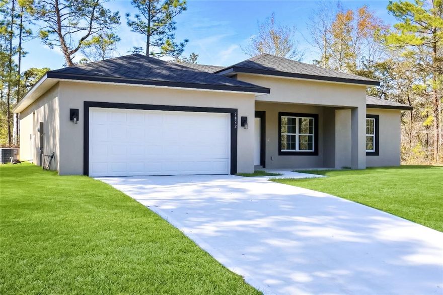 MOVE-IN READY NEW CONSTRUCTION! Welcome to your new home in the beautiful community of Citrus Springs. This 3 bedroom, 2 bath, 2 car garage home has the features that you're looking for: HIGH CEILINGS throughout the home, OPEN CONCEPT, SPLIT BEDROOMS, and QUARTZ COUNTERTOPS in the kitchen and baths. Upon entering through the double front doors, you will love the expansive feel of the open entertaining area, which includes a spacious living room and dining room, with a kitchen that includes KITCHEN ISLAND, PANTRY CLOSET, and SAMSUNG stainless steel appliances and lots of countertop space. Going left of the entertaining space, you will find the PRIMARY BEDROOM AT THE BACK of the home, with a large WALK-IN CLOSET, and an ENSUITE BATH that includes DUAL SINKS, a SEPARATE TOILET ROOM, and a HUMONGOUS SHOWER WITH 2 SHOWER HEADS controlled by separate valves. The laundry is located inside the home, between the primary bedroom and the garage. Moving across to the other side of the home, you will find 2 other bedrooms of very good size, separated by a guest bathroom that includes a tub and shower combination with tiled tub surround. Access the backyard and COVERED REAR LANAI through the sliding door in the dining room. Schedule your showing today and make this beautiful home yours!