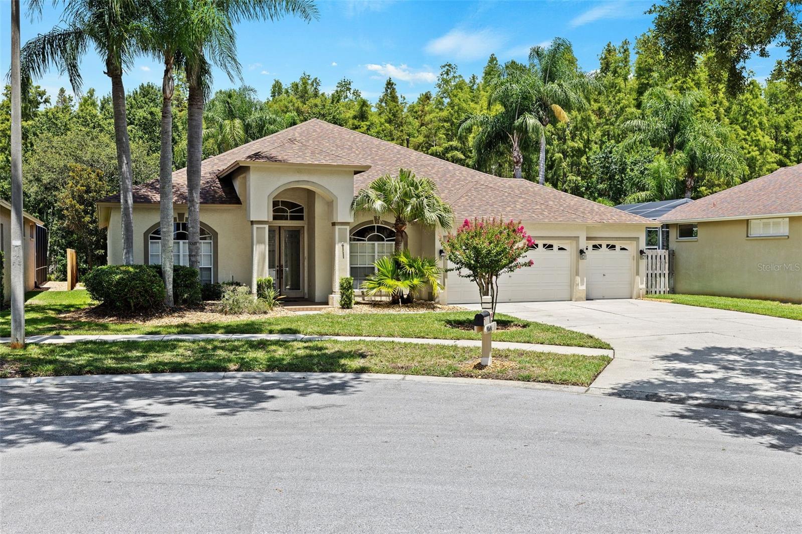 Located in a Gated part of Villarosa on a QUIET CUL-DE-SAC this home is situated on a CONSERVATION LOT with 4 Bedrooms, 3 Bathrooms, 3 Car Garage with a SCREENED-IN POOL WITH SPA with an outdoor kitchen area ready for entertainment and pool parties ~ As you walk up you have Double Door Entry with a spacious Foyer ~On one side you have a DEN/OFFICE and on the other you have a more formal Dining Area. As you continue, you have a Spacious Kitchen with STAINLESS STEEL APPLIANCES with lots of counter space and a walk-in pantry and informal dining area. The Kitchen opens into a Large Living Area with a Built-in FIREPLACE. The Living area has large sliders that flow into the covered lanai & Screened-in Pool and Spa showcasing the peaceful natural surrounding of the Backyard with its matured trees where you may see a few deer while sipping your morning coffee. Split Floor Plan with Master Suite with direct access to the Pool and the scenic backyard views. The En suite Bathroom includes dual closets, dual vanities with a walk-in Shower & a Garden-Size Tub. On the other side you have 2 full baths with 3 bedrooms and a convenient LAUNDRY ROOM with full size washer and dryer. Recent Updates to this home include NEW ROOF (2025), WATER HEATER (2024), A/C (2019). PLUS, this home is located in the highly-rated school zone that includes McKitrick Elem, Martinez MS & Steinbrenner HS ~ EZ ACCESS to Veterans & Suncoast Expressways and other major highways for EZ commute to the Tampa International Airport, Downtown and the BEACHES.