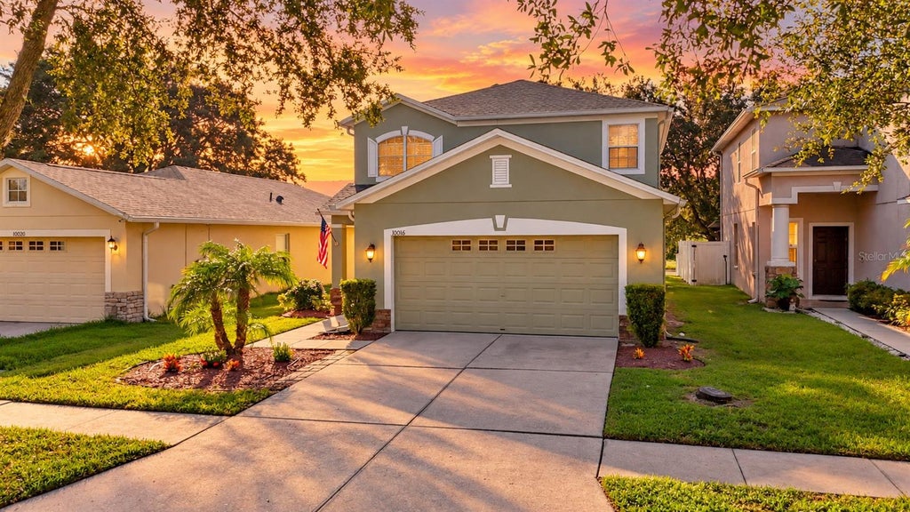 Photo of 10016 Perthshire Circle, Land O Lakes, FL 34638 (MLS # TB8552315)
