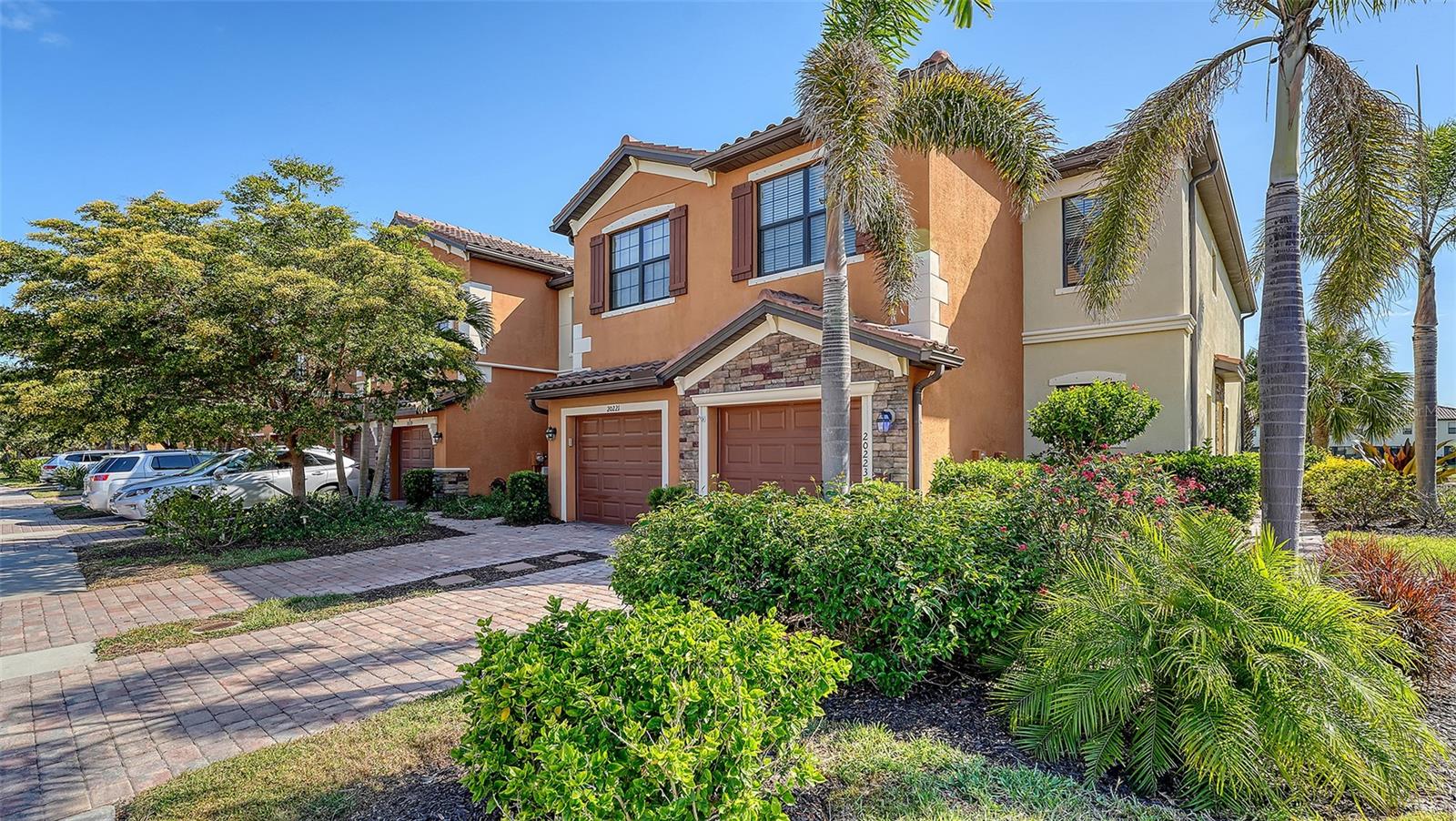 Gorgeous 3 bedroom 2 and a half bath townhome is located in Gran Paradiso within the sought after Wellen Park Community. This "Ava" end unit townhome offers chic modern furnishings and features a lovely leaded glass front door allowing natural light into the kitchen and dining area. The Kitchen is well stocked and features stainless steel appliances with a breakfast bar opening up to the dining/living room. A half bath located by the dining room is a perfect powder room on lower level. Enjoy the screened in lanai off the living room with a lovely view of the lake. This floorplan features well thought out living space and is able to accommodate a large family. Three spacious bedrooms are located on the second floor. The large master bedroom has walk in closets, ensuite bath with double sinks and walk in shower. Two additional bedrooms share a large bathroom with a tub/shower combo. Washer and dryer are conveniently located upstairs. The screened in lanai is the ideal spot for entertaining guests, enjoying coffee in the morning, meals in the evening and afternoon naps. A one-car garage keeps the car, beach toys and favorite tools safe and dry year-round. Come enjoy resort style living within the premier gated community of Gran Paradiso. Visit the Tuscan-inspired Clubhouse with state-of-the-art gym, billiards room, sauna, community pool & spa with poolside cabanas, tennis courts, card rooms, library, Activities director on site and so much more! Close to area beaches, Atlanta Braves Stadium, boutiques, walking trails and restaurants in downtown Wellen Park, Venice and Punta Gorda. *Once approved- *HOA requires 15 days' notice with fully executed lease no later than 15 business days prior to move-in and requires board approval*