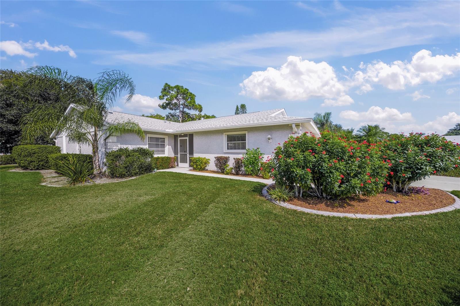 You have WAITED for it - the owner has DONE it! A BIG PRICE IMPROVEMENT in the Villas of Cedar Creek! Seller looking for a "call to action" on this villa - she wants to make a DEAL now! Summer is upon us - time to make this property your own!!! CONCRETE BLOCK AND BUILT TO LAST! Come and take a look at this 2 bedroom/2 bath villa as it is a dream retirement or investment home - YES you may lease it! This villa sits on a pie shaped lot - the largest lot in the community with beautiful, pristine lush landscaping. Large screened in lanai with beautiful pond view with fountain - sit with your coffee or cocktail and watch nature happen. You never know what you're going to see from day to day - it's spectacular! Step outside the lanai where the owners have created a great outdoor space with paver patio - set up your grill and outdoor seating and enjoy! This property is "move in ready" - just apply your creativity inside as this space is wide open with luxury vinyl plank floors throughout and ready for your touches. The kitchen has a pass-through window to the dining area, offers a closet pantry, as well as a breakfast table at the window looking outside to the expansive front yard. The living and dining area is one large open space and in the awesome cooler months, open the sliding doors to extend to outdoor living. Inside the primary bedroom is quite spacious with sliders opening to the lanai, and offers a large walk in closet; the en-suite bathroom has a step in shower and dual vanities. The spacious 2nd bedroom features a Murphy bed system with built in cabinets, drawers and shelves and a walk in closet as well. This is one of the few homes with inside laundry! Make seller a reasonable offer before the end of July and receive $1,000 towards a NEW washer/dryer! The roof and A/C are just 7+ yrs. young and owner has just installed a NEW WATER HEATER (June '25) The neighborhood is beautifully maintained with the villa's having its own pool & seating for gatherings with a small kitchen and a pavered patio area where you can bring your grill for the events you may want to have with neighbors or family and friends. Did I mention the LOW FEES??? ONLY $238/MO paid qtly at $715. Cedar Creek is located just off University Parkway where you have absolutely everything within reach in just a few minutes - and I mean everything; shopping and restaurants, doctors, banks, movie theatre, Benderson park with trails and crew racing - the list goes on. The Villas of Cedar Creek remain one of the best investments in a villa as they all have a 2 car garage, are pet friendly with no pet weight limit so bring your FUR BABY! The community has many ponds and mature landscaping - these homes are solid and have weathered beautifully in every storm and hurricane! OWNER SAID "LET'S WORK TOGETHER NOW"!